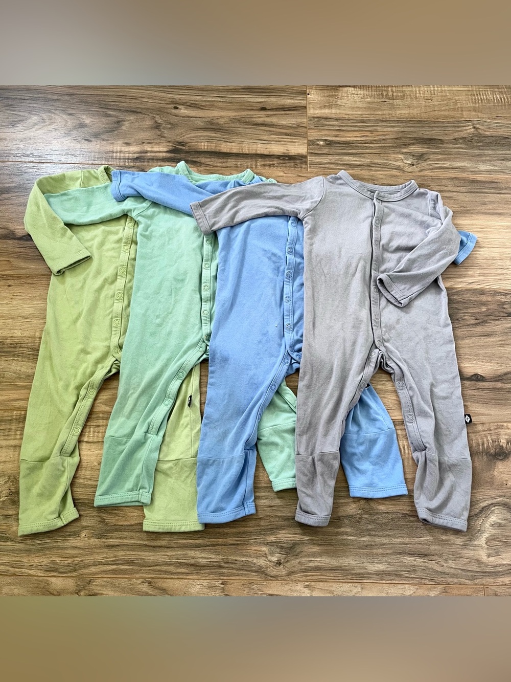 Bundle of Kyte Baby snap rompers